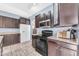 Kitchen features granite countertops, stainless steel appliances, ample storage, and an open layout at 8931 W Alex Ave, Peoria, AZ 85382
