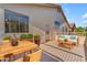 Outdoor patio with a dining set and sofa seating, perfect for outdoor entertaining and relaxation at 8931 W Alex Ave, Peoria, AZ 85382