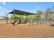 Outdoor playground for children with swings, slides, and climbing structures at 8931 W Alex Ave, Peoria, AZ 85382