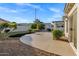 Beautiful backyard with lush landscaping and decorative rock, providing a serene outdoor space at 896 N Kingston St, Gilbert, AZ 85233