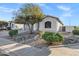 Attractive single-story home with desert landscaping, a wide driveway, and a covered front entrance at 896 N Kingston St, Gilbert, AZ 85233