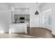 Modern kitchen with gray cabinets, backsplash, pendant lighting, and quartz countertops at 896 N Kingston St, Gilbert, AZ 85233