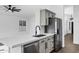 Bright kitchen with white quartz countertops, gray cabinets, and stainless refrigerator at 896 N Kingston St, Gilbert, AZ 85233