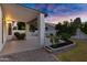 Covered patio area with decorative landscaping, desert rock, and views of a private backyard at 896 N Kingston St, Gilbert, AZ 85233
