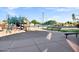 Community playground featuring slides, climbing structures, and benches in a well-maintained, sandy play area at 896 N Kingston St, Gilbert, AZ 85233