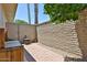 Backyard with brick pavers and block wall at 10648 W Loma Blanca Dr, Sun City, AZ 85351