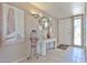 Inviting entryway featuring tile flooring, modern decor, and a well-lit space at 10648 W Loma Blanca Dr, Sun City, AZ 85351