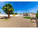 Expansive backyard featuring low maintenance landscaping, with artificial turf, gravel and pavers at 1304 W Ocotillo Rd, Phoenix, AZ 85013