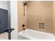 Modern bathroom featuring updated hardware, tiled shower and tub with neutral colors at 1304 W Ocotillo Rd, Phoenix, AZ 85013