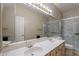 Bathroom with double sinks, large mirror, and shower at 15809 S 31St St, Phoenix, AZ 85048