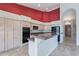 Spacious kitchen with granite countertops, modern appliances, and ample cabinet space at 15809 S 31St St, Phoenix, AZ 85048