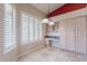 Office with custom cabinets, granite desk, and plantation shutters at 15809 S 31St St, Phoenix, AZ 85048