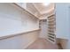 A spacious walk-in closet with ample shelving and hanging space at 15809 S 31St St, Phoenix, AZ 85048