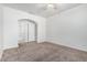 Neutral bedroom with carpet and access to ensuite bathroom at 15941 N 171St Ln, Surprise, AZ 85388