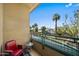 View from the balcony, featuring seating with views of palm trees lining the street at 17 W Vernon Ave # 31, Phoenix, AZ 85003