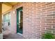 Brick condo with green trim and patio area at 17 W Vernon Ave # 31, Phoenix, AZ 85003