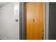 Condo front door with peephole, unit number, and sidelight fixture at 17 W Vernon Ave # 31, Phoenix, AZ 85003