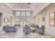 Large open community lounge space with ample seating, neutral colors, and high ceilings at 17 W Vernon Ave # 31, Phoenix, AZ 85003