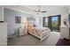The main bedroom features neutral tones and a balcony view with a queen size bed at 17 W Vernon Ave # 31, Phoenix, AZ 85003