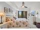 The main bedroom features neutral tones and a balcony view with a queen size bed at 17 W Vernon Ave # 31, Phoenix, AZ 85003