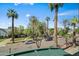 From the balcony, the view of the street with palm trees and various cars at 17 W Vernon Ave # 31, Phoenix, AZ 85003