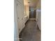 Bathroom with a spacious vanity and a glass-enclosed shower with neutral tile at 1725 W Pollack St, Phoenix, AZ 85041