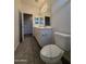 Bathroom featuring a double vanity, toilet, and mirror at 1725 W Pollack St, Phoenix, AZ 85041