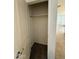 Entryway closet with coat hanger, and door to entry and kitchen with tile floors at 1725 W Pollack St, Phoenix, AZ 85041