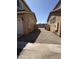 View of two tan homes and back yard of neighboring home at 1725 W Pollack St, Phoenix, AZ 85041