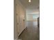 Open-concept view from front door to living room with tiled floors at 1725 W Pollack St, Phoenix, AZ 85041