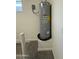 Garage featuring water heater with close proximity to window and overhead lighting at 1725 W Pollack St, Phoenix, AZ 85041