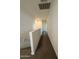 Carpeted hallway with stairway at 1725 W Pollack St, Phoenix, AZ 85041