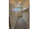 Laundry room with tile flooring, overhead lighting, and window at 1725 W Pollack St, Phoenix, AZ 85041