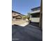 Peaceful street view showcasing neighborhood homes with garages and landscaping at 1725 W Pollack St, Phoenix, AZ 85041