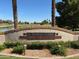 El Dorado Lakes Golf Community welcome sign near a tranquil lake offering a premier living experience at 1802 W Encinas St, Gilbert, AZ 85233