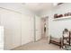 Bedroom featuring large closet and neutral decor at 19822 N 108Th Ave, Peoria, AZ 85373