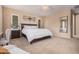 Serene bedroom with lots of natural light and calm colors, providing a peaceful atmosphere at 20211 N Winter Escape Ct, Maricopa, AZ 85138