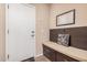 Inviting entryway with a convenient built-in bench and storage, perfect for organization at 20211 N Winter Escape Ct, Maricopa, AZ 85138