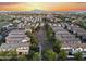 A sweeping aerial view of a neighborhood showcasing the tree-lined streets and meticulously landscaped homes at 20872 W Thomas Rd, Buckeye, AZ 85396
