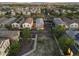 A beautiful aerial view of the home nestled in a vibrant community with mountain views at 20872 W Thomas Rd, Buckeye, AZ 85396