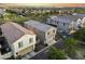 A scenic aerial view displaying a residential community with an inviting backyard patio at 20872 W Thomas Rd, Buckeye, AZ 85396