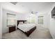 Serene main bedroom with a large bed, soft lighting, and a comfortable, inviting atmosphere at 20872 W Thomas Rd, Buckeye, AZ 85396