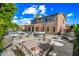 Spacious backyard featuring a built-in BBQ, patio area, fire pit, and outdoor dining furniture, perfect for entertaining at 2282 E Zion Way, Chandler, AZ 85249