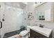 Modern bathroom featuring a glass enclosed shower with white subway tile and decorative mirror at 2282 E Zion Way, Chandler, AZ 85249