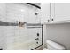 Modern bathroom featuring stylish subway tiles and a glass shower door at 2282 E Zion Way, Chandler, AZ 85249