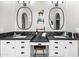 Luxurious bathroom features dual sinks, vanity area, and elegant mirrors at 2282 E Zion Way, Chandler, AZ 85249