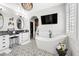 Bathroom showcasing tile floors, a tub, a vanity, and natural light at 2282 E Zion Way, Chandler, AZ 85249