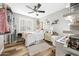 Cozy bedroom with a ceiling fan, comfortable bed, and a bright window at 2282 E Zion Way, Chandler, AZ 85249