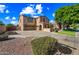 Spacious two-story home with a three-car garage and desert landscaping at 2282 E Zion Way, Chandler, AZ 85249