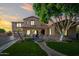 Charming two-story home boasts a landscaped front yard and a welcoming entrance with arched detailing at 2282 E Zion Way, Chandler, AZ 85249